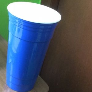 A plastic blue solo cup